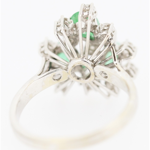 375 - Finely Detailed Pear Cut Emerald Three Stone and Diamond Cluster Ring Set in 14 Carat White Gold Rin... 