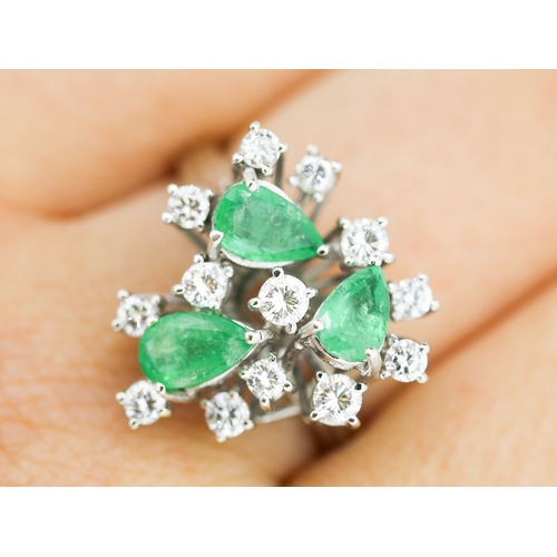 375 - Finely Detailed Pear Cut Emerald Three Stone and Diamond Cluster Ring Set in 14 Carat White Gold Rin... 