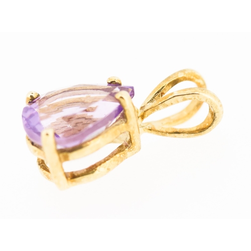 392 - Pear Cut Amethyst Set Pendant Mounted in 9 Carat Yellow Gold 1cm High