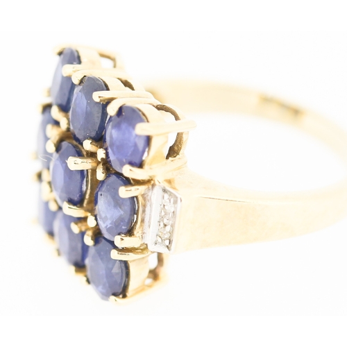 399 - Nine Stone Sapphire Set Ring Mounted in 9 Carat Yellow Gold Diamond Inset to Shoulders Ring Size N a... 