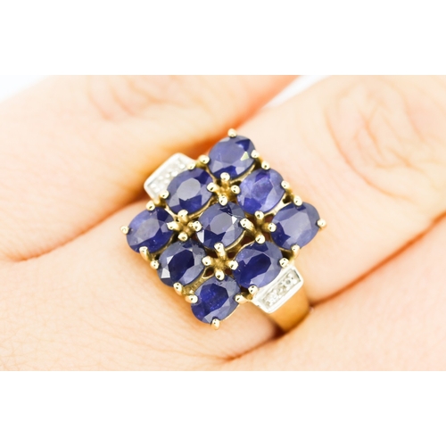 399 - Nine Stone Sapphire Set Ring Mounted in 9 Carat Yellow Gold Diamond Inset to Shoulders Ring Size N a... 