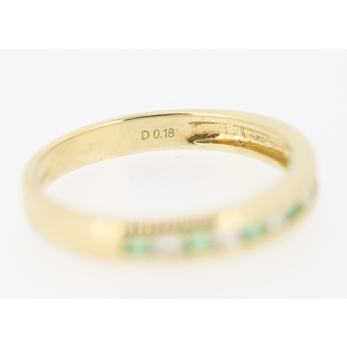 432 - Emerald and Diamond Channel Set Half Eternity Ring Mounted in 9 Carat Yellow Gold Ring Size N