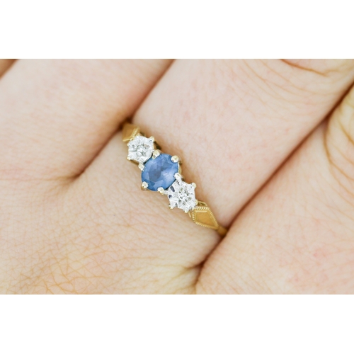 480 - Blue Topaz and Diamond Set Ring Mounted in 9 Carat Yellow Gold Ring Size U