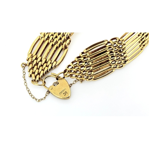 482 - 9 Carat Yellow Gold Seven Bar Link Bracelet Heart Padlock Clasp and Safety Chain Present