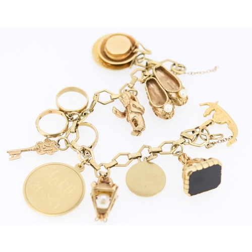 490 - 9 Carat Yellow Gold Charm Bracelet with Ballet Slippers Rings Fob and Other Charms 17cm Long Note Cl... 