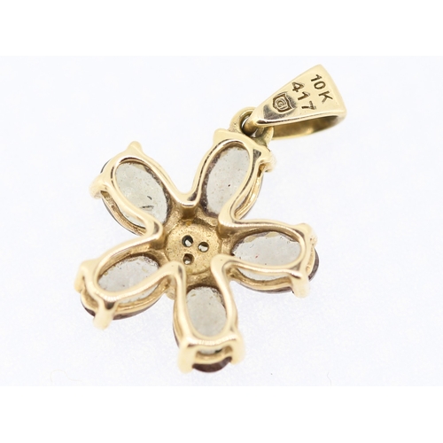 500 - Smoky Quartz and Diamond Set Daisy Form Pendant Mounted in 9 Carat Yellow Gold 1.5cm High