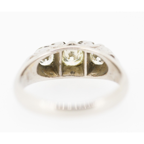 532 - Diamond Three Stone Ring Mounted in 18 Carat White Gold Incised Detail Ring Size K