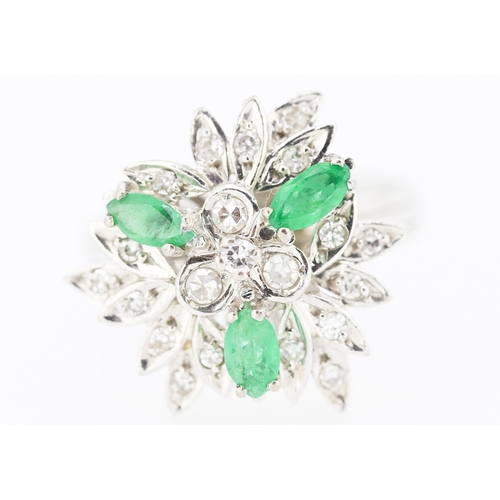 534 - Emerald and Diamond Floral Design Cluster Ring Mounted on 18 Carat White Gold Attractively Detailed ... 