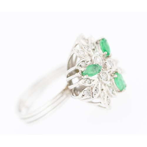 534 - Emerald and Diamond Floral Design Cluster Ring Mounted on 18 Carat White Gold Attractively Detailed ... 