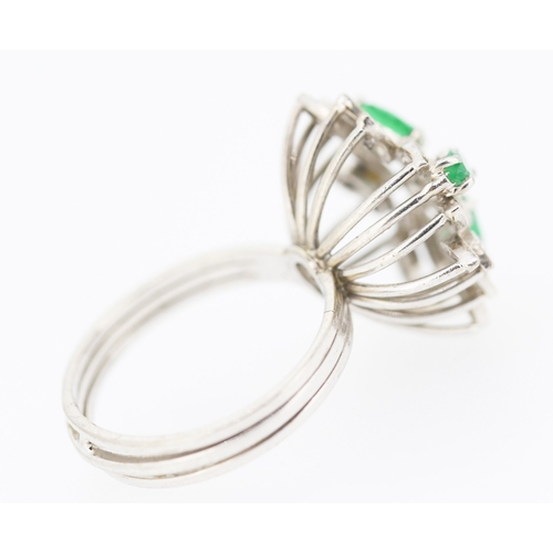 534 - Emerald and Diamond Floral Design Cluster Ring Mounted on 18 Carat White Gold Attractively Detailed ... 