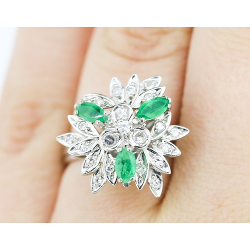 534 - Emerald and Diamond Floral Design Cluster Ring Mounted on 18 Carat White Gold Attractively Detailed ... 