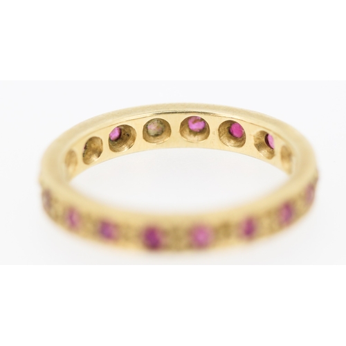 544 - Ruby Set Eternity Ring Mounted in 9 Carat Yellow Gold Ring Size Q