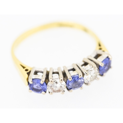 545 - Five Stone Sapphire and Diamond Set Ring Mounted in 18 Carat Yellow Gold Ring Size N