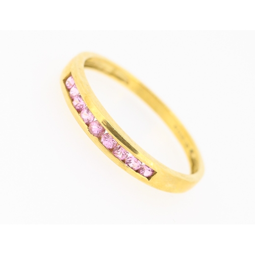 56 - Pink Tourmaline Nine Stone Channel Set Ring Mounted in 9 Carat Yellow Gold Ring Size W