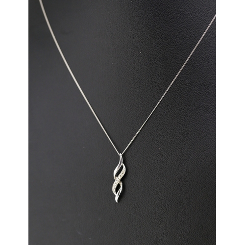 579 - Gemset 9 Carat White Gold Swirl Motif Pendant 2cm Set on 9 Carat White Gold Chain 40cm Long