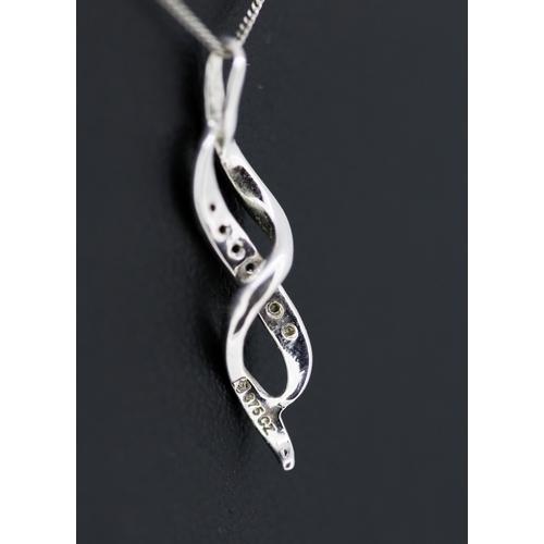 579 - Gemset 9 Carat White Gold Swirl Motif Pendant 2cm Set on 9 Carat White Gold Chain 40cm Long