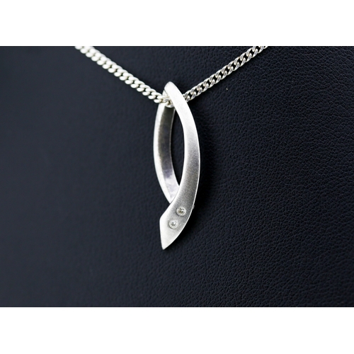 583 - Silver Diamond Set Ribbon Form Pendant 3cm High Set on Silver Chain 46cm Long with Original Presenta... 