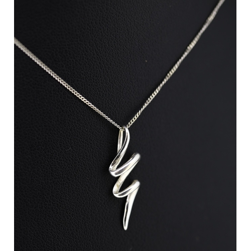 588 - 9 Carat White Gold Swirl Motif Pendant 2cm Set on 9 Carat White Gold Chain 40cm Long