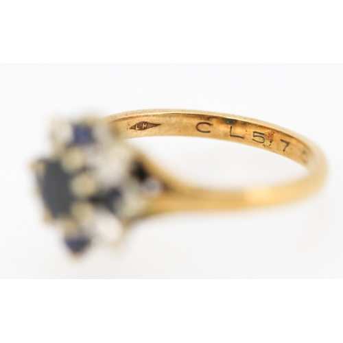 591 - Sapphire and Diamond Set Cluster Ring Mounted in 9 Carat Yellow Gold Ring Size M