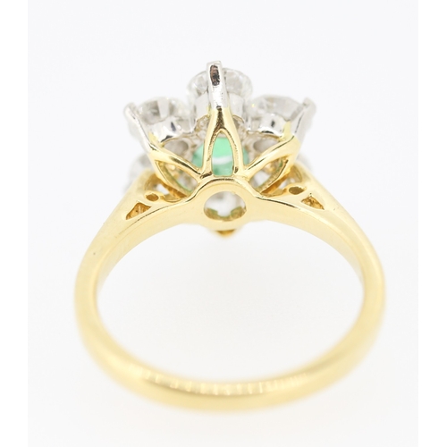 60 - Emerald and Diamond Set Daisy Form Cluster Ring Mounted in 18 Carat Yellow Gold Total Emerald Carat ... 