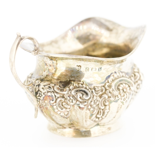 608 - Silver Repousse Decorated Cream Jug 9cm High