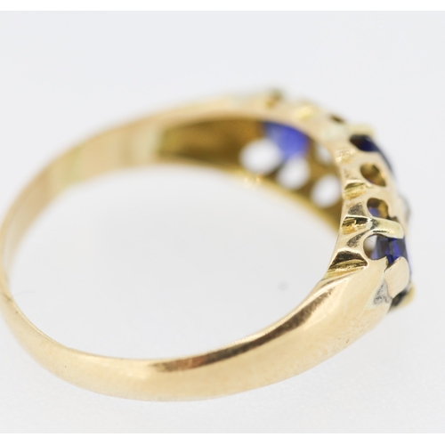 627 - Three Stone Sapphire and Diamond Set Ring Mounted in 18 Carat Yellow Gold Ring Size J