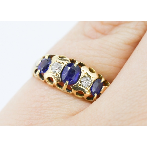 627 - Three Stone Sapphire and Diamond Set Ring Mounted in 18 Carat Yellow Gold Ring Size J