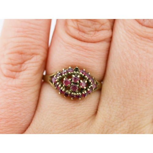 66 - Ruby Cluster Set Ring Mounted in 9 Carat Yellow Gold Ring Size N Note One Stone Lacking