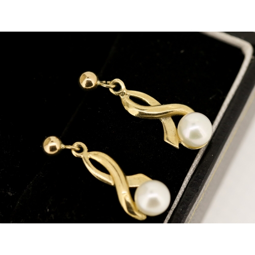 68 - Pair of Pearl Set Drop Earrings Set on 9 Carat Yellow Gold 1.5cm Drop