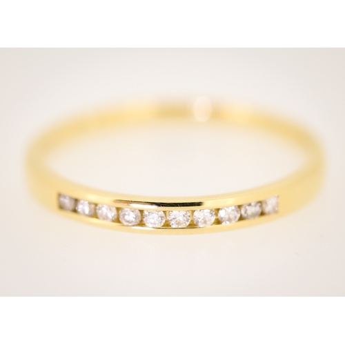 77 - Diamond Ten Stone Channel Set Band Ring Mounted in 18 Carat Yellow Gold Ring Size R