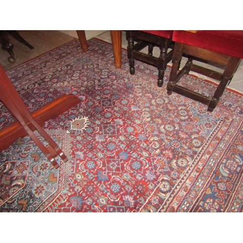 777 - Persian Pure Wool Rug Burgundy and Navy Ground Approximately 9ft 8 Inches Long x 6ft 6 Inches Wide