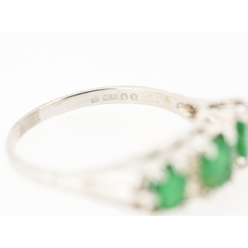 80 - Emerald Three Stone Ring with Diamond Insets Mounted in 18 Carat White Gold Ring Size P and a Half