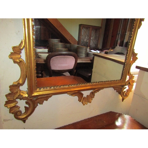 804 - Gilded Wall Mirror Upper Cartouche Decoration Approximately 40 Inches High x 26 Inches Wide