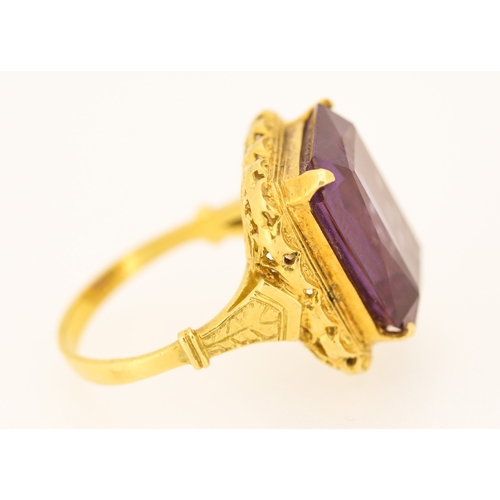 85 - Possibly Alexandrite Single Stone Set Ring Mounted in 18 Carat Yellow Gold Ring Size N