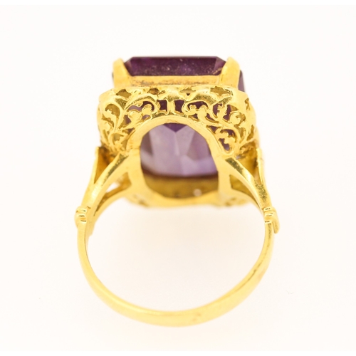 85 - Possibly Alexandrite Single Stone Set Ring Mounted in 18 Carat Yellow Gold Ring Size N