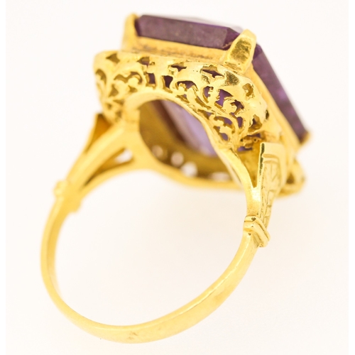 85 - Possibly Alexandrite Single Stone Set Ring Mounted in 18 Carat Yellow Gold Ring Size N