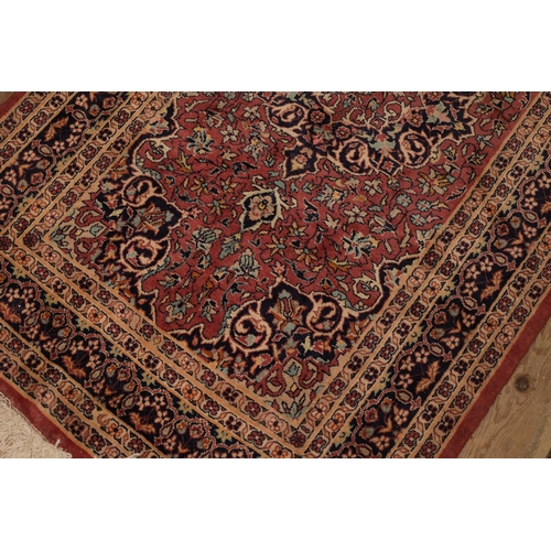 853 - Persian Pure Wool Rug Burgundy and Navy Ground Patterned Borders Approximately 4ft 6 Inches Long x 3... 