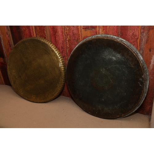 864 - Two Eastern Engraved Cast Brass Benares Trays Circular Form Largest Approximately 21 Inches Diameter