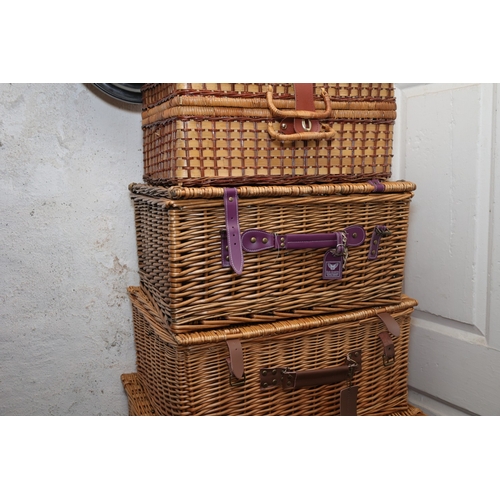 892 - Four Wicker Picnic or Hamper Baskets Largest Approximately 24 Inches Wide x 9 Inches High