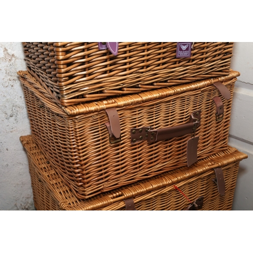 892 - Four Wicker Picnic or Hamper Baskets Largest Approximately 24 Inches Wide x 9 Inches High