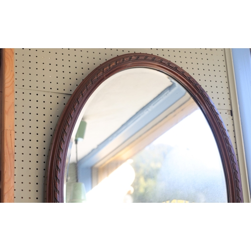 908 - Edwardian Mahogany Framed Oval Form Mirror Approximately 34 Inches High x 22 Inches Wide