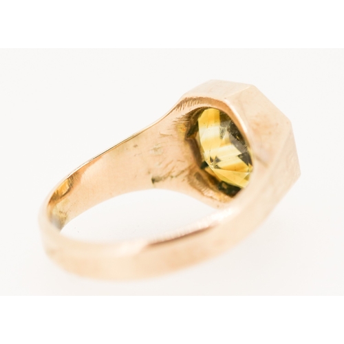 94 - Bezel Set Citrine Single Stone Octagon Form Ring Mounted in 9 Carat Rose Gold Ring Size R