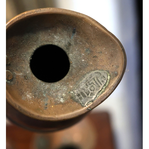 945 - Three Copper Measuring Jugs with Two Copper Napkin Rings with Two Shield Form Stands Seven Pieces in... 