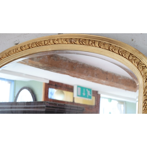 980 - Gilded Over Mantle Mirror Arched Top Side Carved Decoration Approximately 50 Inches Wide x 54 Inches... 