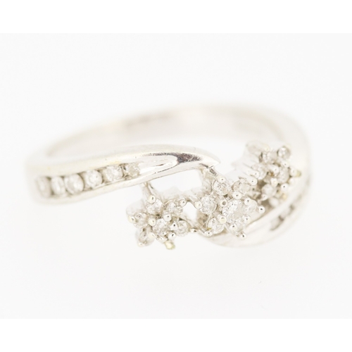 Diamond Set Daisy Motif Wrap Around Form Ring with Further Diamonds Set to Shoulders Mounted in 9 Carat White Gold Ring Size N Note Some Stones Lacking