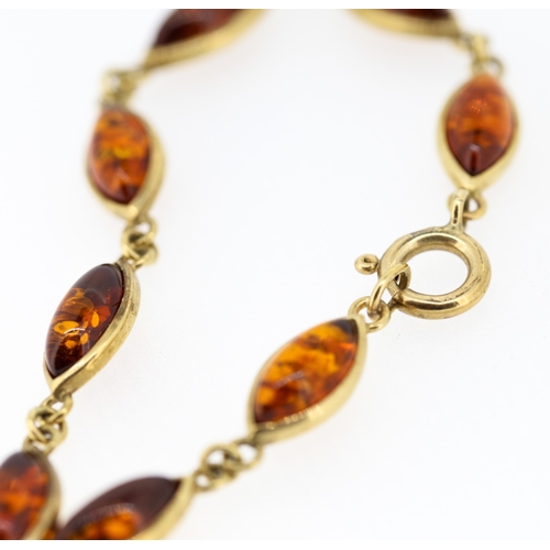 61 - Amber Eight Stone Set Bracelet Mounted in 9 Carat Yellow Gold 19.5cm Long