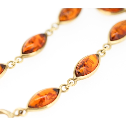 61 - Amber Eight Stone Set Bracelet Mounted in 9 Carat Yellow Gold 19.5cm Long