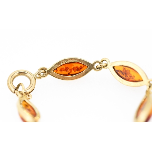 61 - Amber Eight Stone Set Bracelet Mounted in 9 Carat Yellow Gold 19.5cm Long