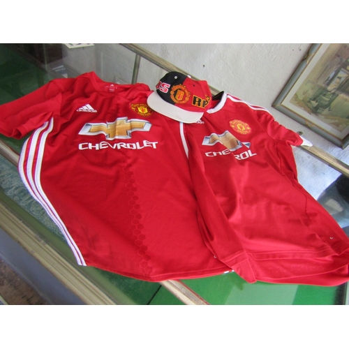 Two Manchester United Jerseys and Hat