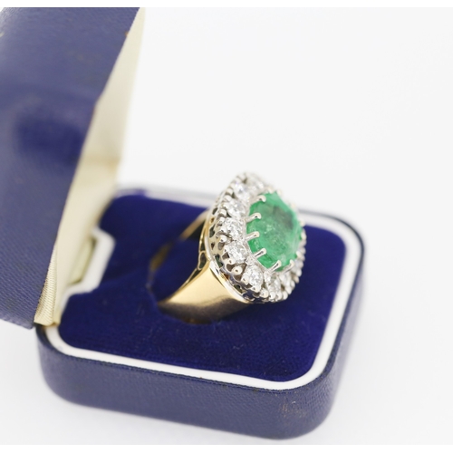 121 - Finely Detailed Emerald Centre Stone Set Ring with Diamond Twelve Stone Halo Set Surround Mounted in... 